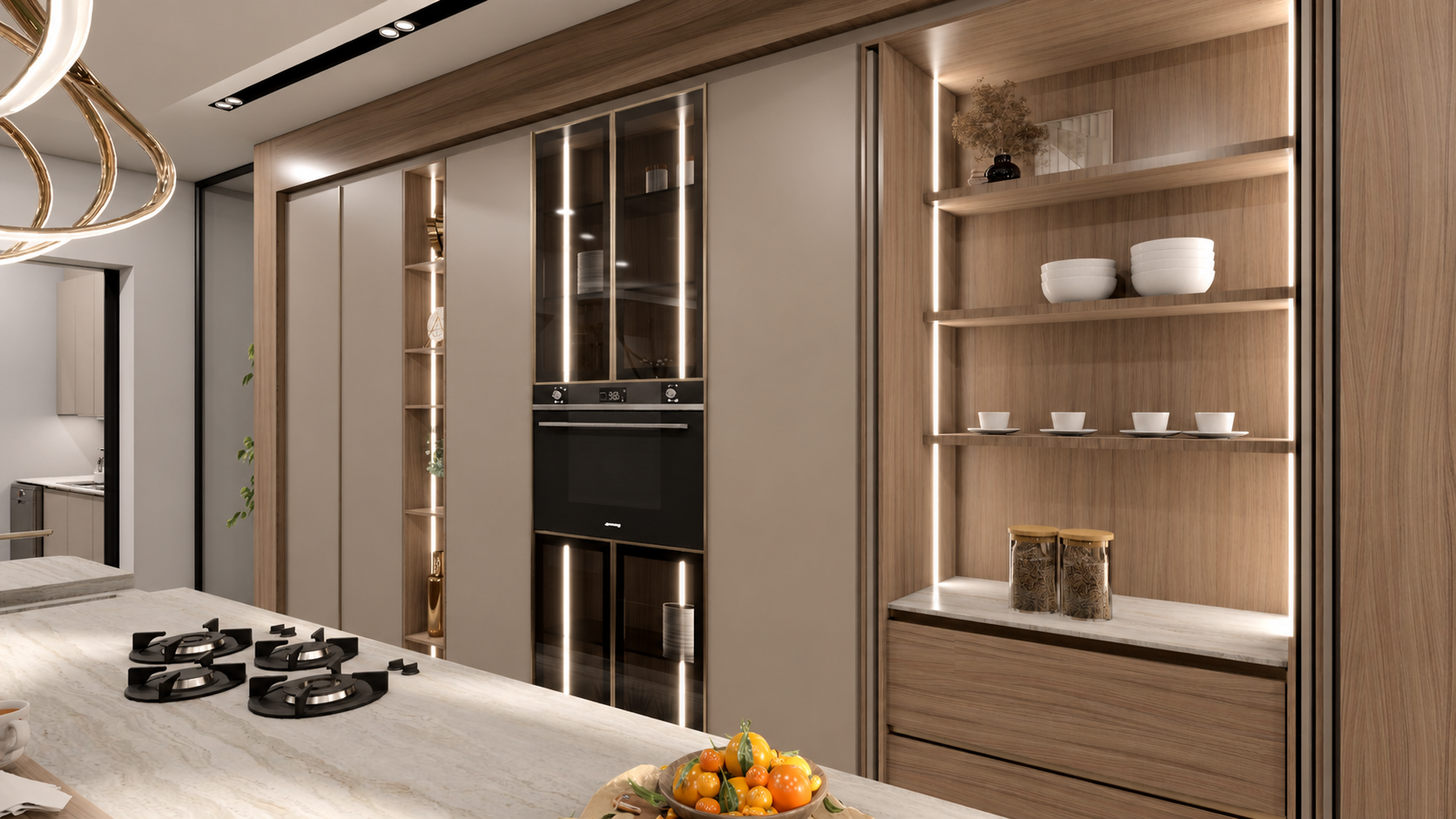 Kitchen — lit display niche and glazed cabinets beside the ovens